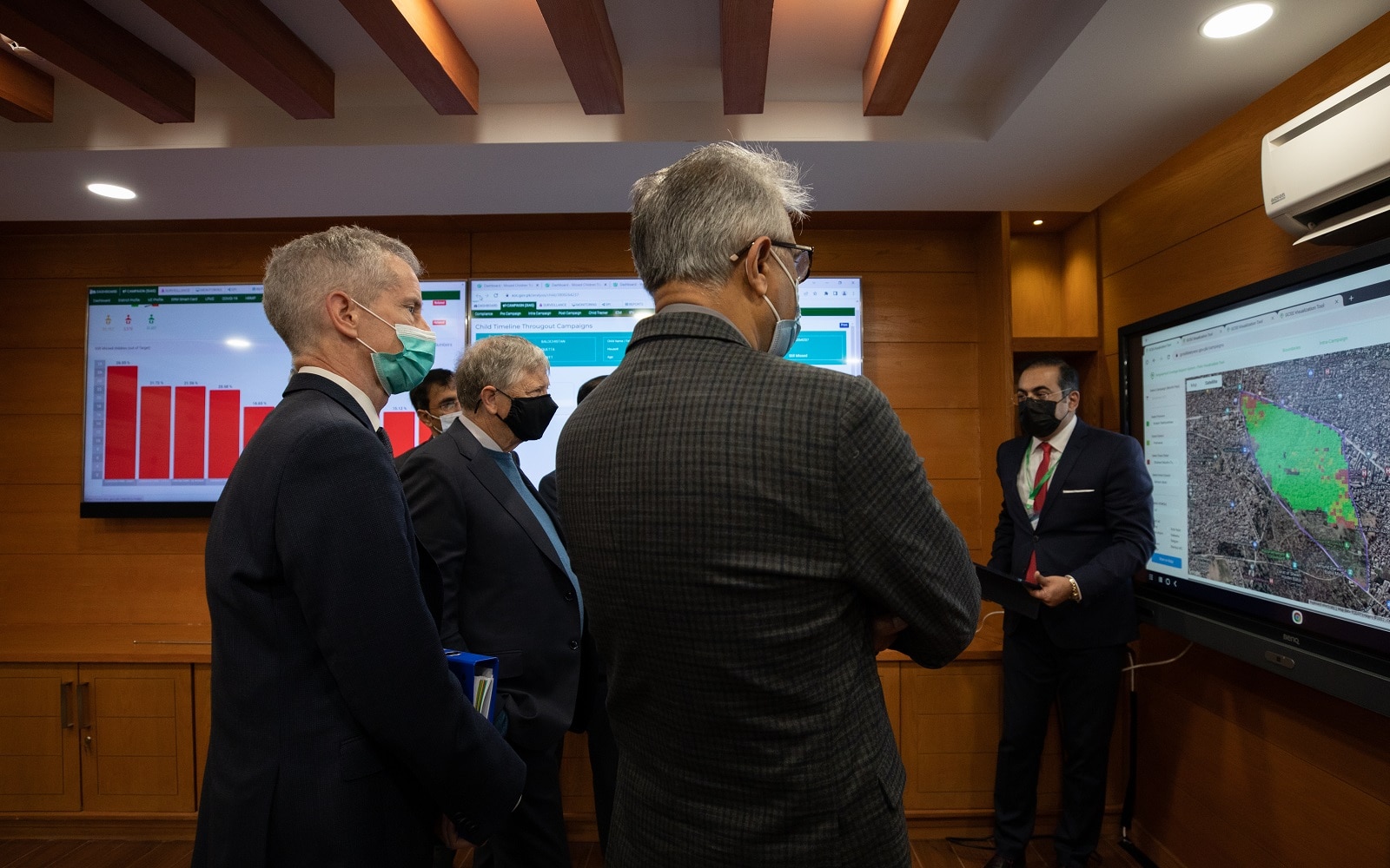 Michael Galway and Bill Gates meet with Pakistan officials and partners to discuss polio data at the National Emergency Operation Centre (NEOC) in Islamabad, Pakistan.