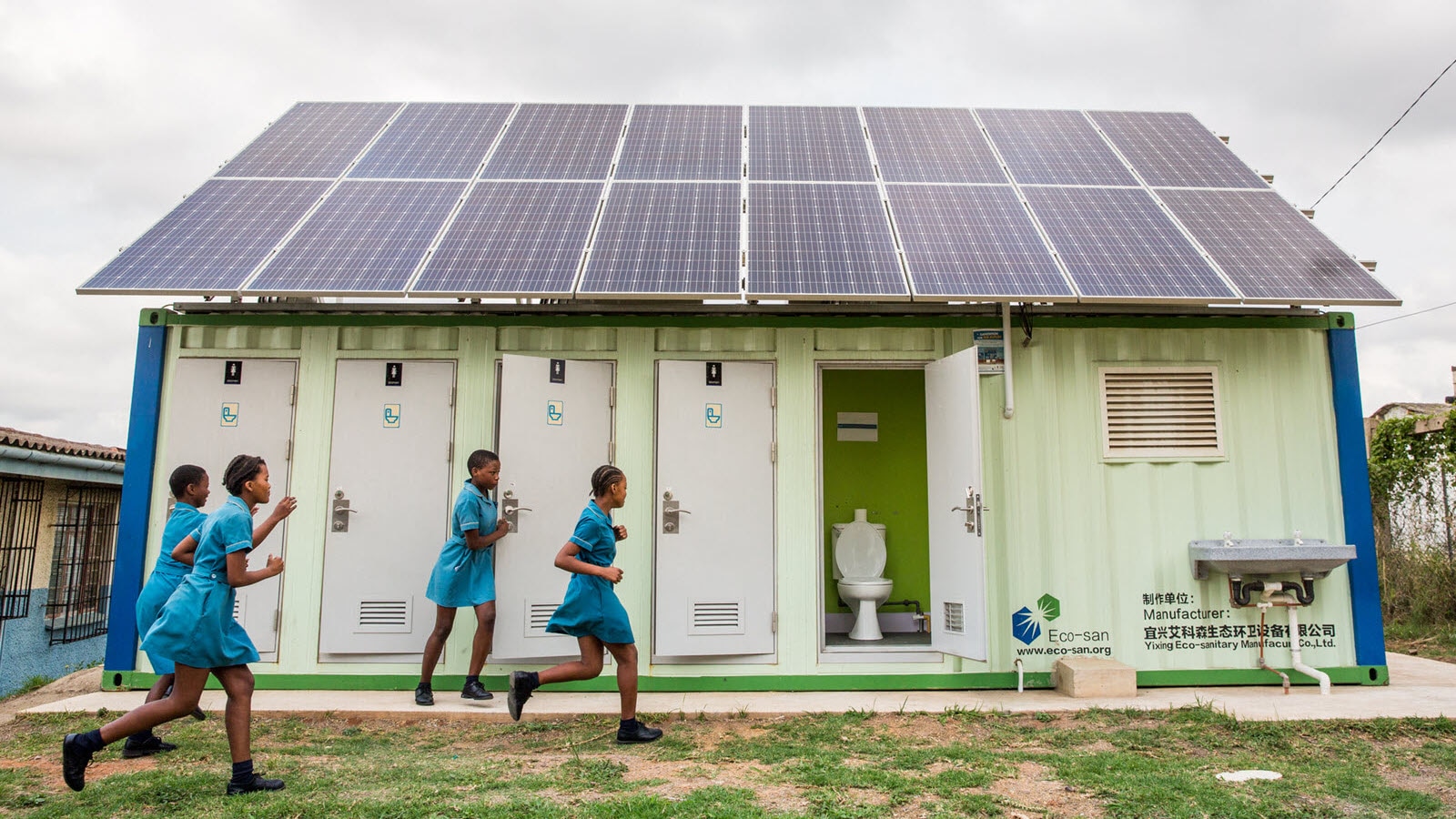 Students in front of toilets at a primary school outside Durban, South Africa.