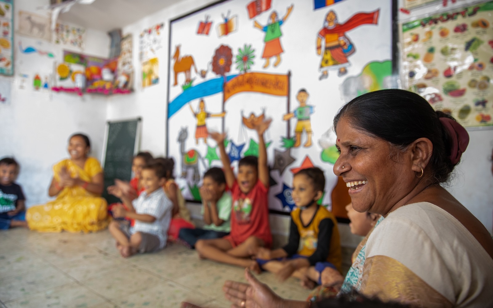  Jashodaben conducts various activity modules with children  based on teacher training programs that she frequently attends in Ahmedabad, Gujarat, India.