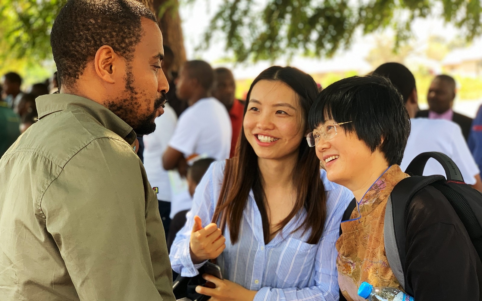 Wendy Wei (right, Bill & Melinda Gates Foundation) discusses China's "1-3-7" approach with scientists and public health experts, in an effort to apply the approach in Tanzania.