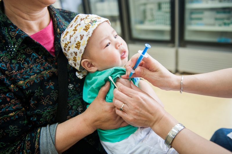 Child receiving immunization