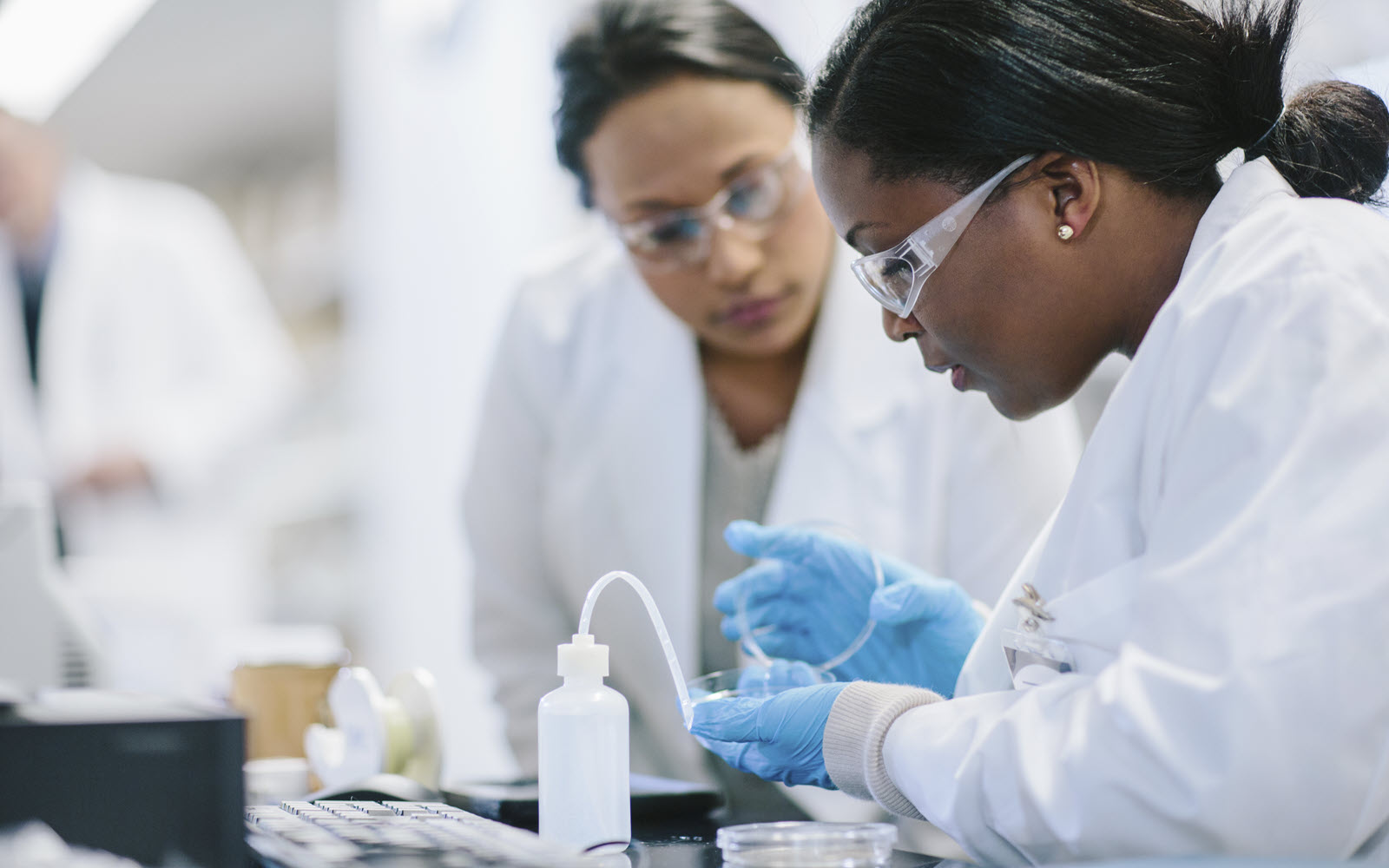 Two women researchers in lab setting